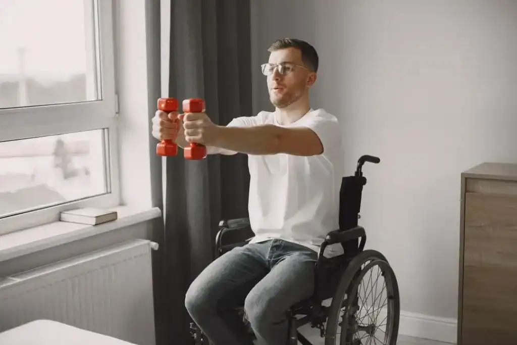 Empowering Weight Loss: A Comprehensive Guide for Individuals with Disabilities 1 Image of man doing exercise in his wheelchair to aid weight loss Scotland