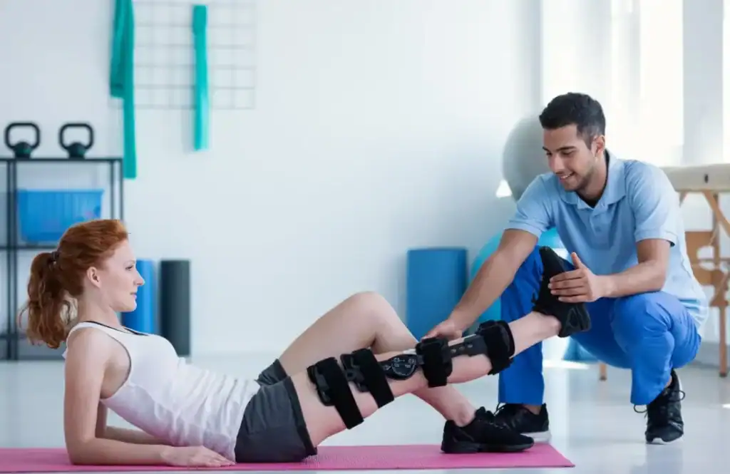 Debunking Meal Timing Myths: The Truth About Muscle Recovery 1 Woman having treatment to help muscle recovery Scotland after an injury