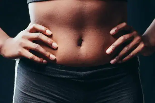Toning Your Stomach: The Ultimate Guide to Achieving a Sculpted Stomach While Shedding Pounds 1 Image of a toned stomach after non surgical treatment Scotland